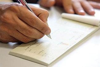 آیا از چک‌ های بانکی مدت‌دار می‌توان شکایت کیفری کرد؟